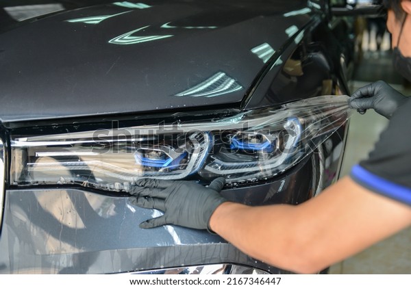 Side\
view of car window tint, ceramic film provides heat rejection and\
UV protection with stable color, car film installed on the glass\
surface of the , selected focus car tinting\
service