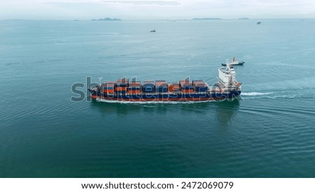 side view Cargo Container Ship with contrail in the ocean ship carrying container and running for export concept technology freight shipping by ship 