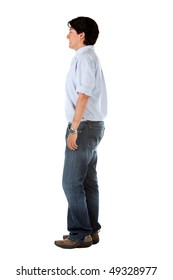 Side View Of A Casual Man Standing Isolated Over A White Background