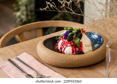 Side view of a chef gourmet dessert. Beautiful and tasty dessert on a bowl. - Shutterstock ID 2209553363