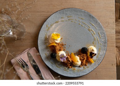 Side view of a chef gourmet dessert. Beautiful and tasty dessert on a plate. - Shutterstock ID 2209553791