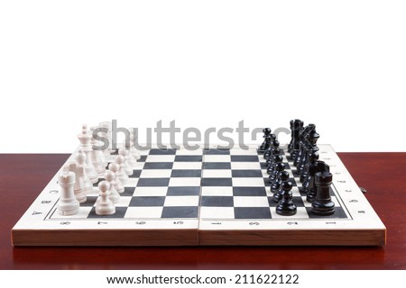 side view chess board set up to begin a game on white background with clipping path