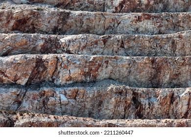 Side View Of Construction Aggregate Quarry, Stepped Slope Of A Mountain