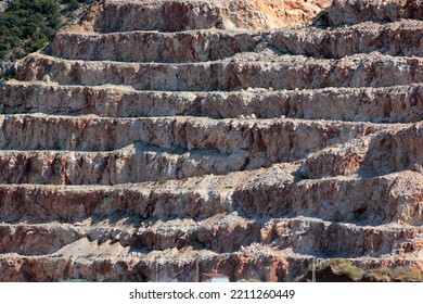 Side View Of Construction Aggregate Quarry, Stepped Slope Of A Mountain