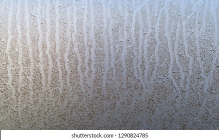 Side View Of A Dirty Gray Car With Rain Streaks.
