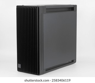 Side view of empty  big tower, PC case, chassis, 15.5 mm front panel grille with 45% porosity for maximum air intake. Studio shoot on white background. 