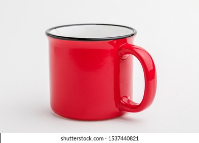 Side View Of Empty Red Enamel Coffee Mug Isolated On White Background