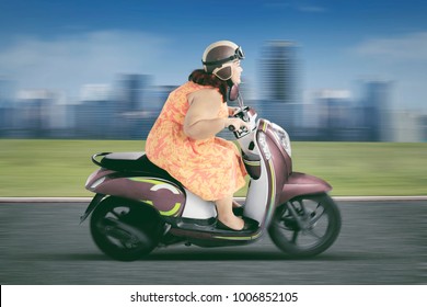 fat girl on a bike