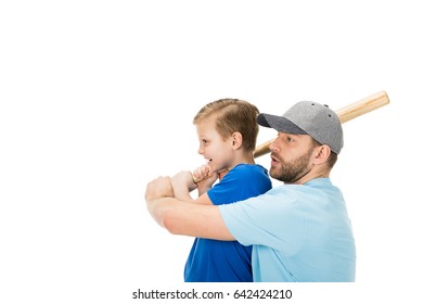 Side View Of Father Teaching His Son How To Play Baseball Isolated On White