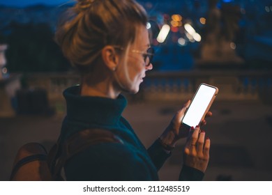 Side View Of Female Reading Received Email On Cellphone With Mock Up Screen Connected To 4g Wireless Outdoors, Woman Chatting With Followers On Modern Blank Cellular Device During Mobility Lifestyle