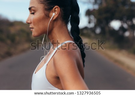 Similar – Image, Stock Photo Runner woman relaxed listening to music for training outdoors