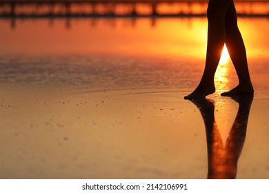 side view Footage of Beautiful Young Woman in the Swimsuit Walking on the Beach towards the Sea. Girl is Very Slim. - Shutterstock ID 2142106991