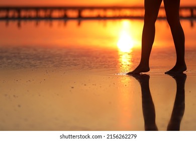 side view Footage of Beautiful Young Woman in the Swimsuit Walking on the Beach towards the Sea. Girl is Very Slim. - Shutterstock ID 2156262279