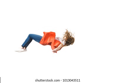 side view of girl in red mantle falling isolated on white 