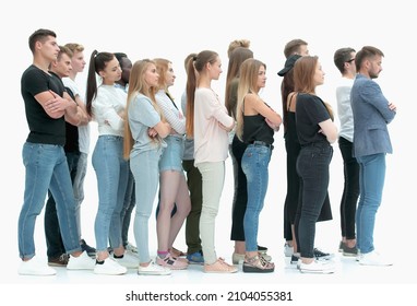 Side View. A Group Of Diverse Young People Standing In A Row