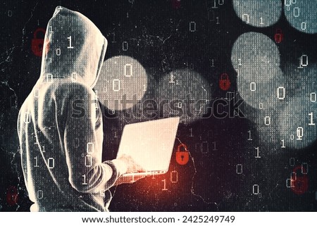 Side view of hacker in hoodie using laptop while standing on abstract dark hacking background with bokeh circles and binary coding. Malware and phishing, data theft concept