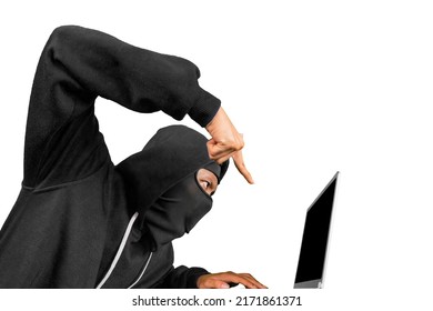 Side View Of Hacker Pointing At The Laptop Screen While Sitting In The Studio. Isolated On White Background