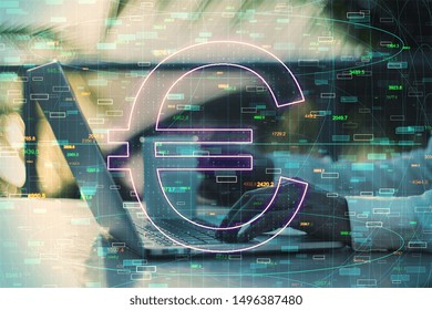 Side view of hands using laptop with glowing digital euro sign on blurry background. Cryptocurrency and finance concept. Double exposure 