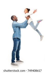 Side View Of Happy African American Father And Daughter Having Fun Together Isolated On White