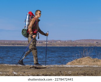 Side view of hiker with artificial leg. Strength, courage and overcoming adversity. - Powered by Shutterstock