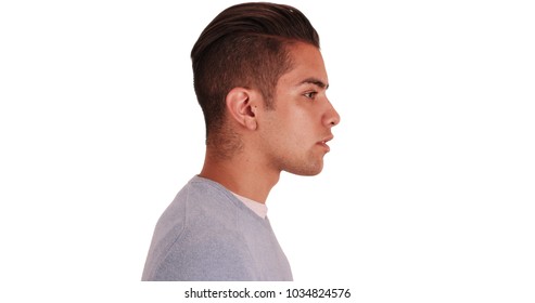 Side View Of Hispanic Man With Cool Undercut Standing With White Background