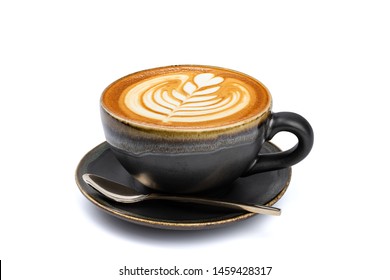 Side view of hot latte coffee with latte art in a vintage matt black cup and saucer isolated on white background with clipping path inside. Image stacking techniques.