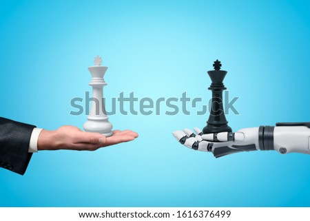 Side view of human hand holding white chess king and android robot hand holding black chess king opposite one another on light blue background. Diplomacy. Artificial intelligence. Man vs Machine.