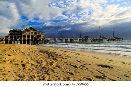 Side view of Jeanettes Pier Nag's Head NC in summer. Night and early morning views with storm coming. 