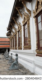 Side View Long White Temple Building Row Ornate Windows Small Gray Stone Statues Sidewalk