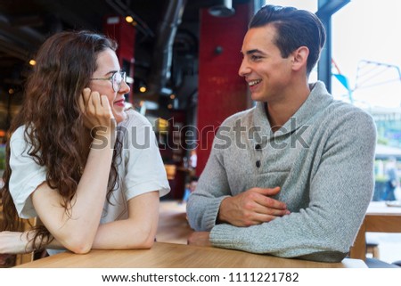 Similar – Image, Stock Photo Side view of loving couple looking at each other