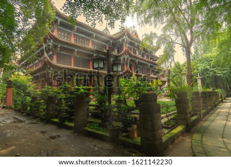 Side view of the main building  under the trees. Sunset at Wenshu Yuan Temple in Wenshu Monastery, Chengdu city, China
