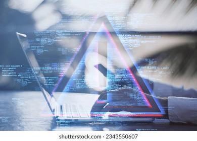 Side view of male hands using laptop at desktop with exclamation mark hologram on blurry background. Hacking, malware and technology concept. Double exposure