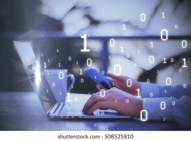 Side view of male hands using smartphone and laptop with binary code. Technology concept