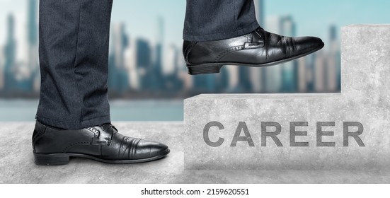 Side View Of Man Climbing Concrete Stairs With Career Text. Sky And City Are In Background. Concept Of Success And Achieving Your Goal. Low Section Of Businessman Walking Up On Staircase