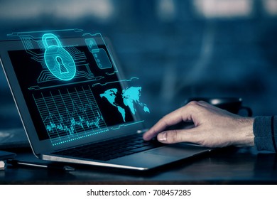 Side view of man hands using laptop with abstract digital padlock hologram on screen. Guard concept - Powered by Shutterstock - Get 15% off with code: PIKWIZARD15