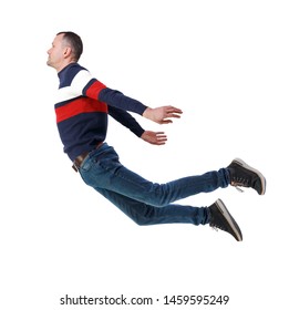 Side View Of Man In Zero Gravity Or A Fall. Guy Is Flying, Falling Or Floating In The Air. Side View People Collection.