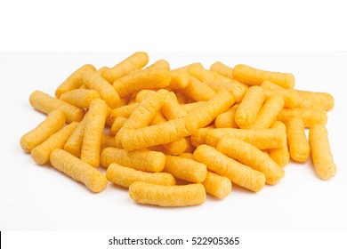 side view of many corn puff snacks isolated on white background