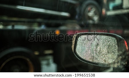 Side View Mirror on Rainy Day