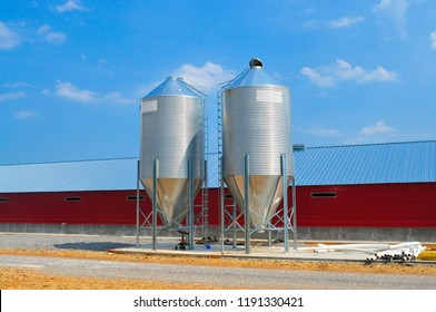 Side View Of A Modern Poultry House Showing Feed Bins 