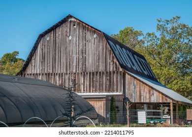 A Side View Of An Old Barn With The Words Advertising Rock City On The Rooftop Closeup View On A Sunny Day In Tennessee