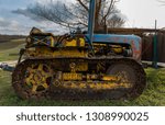 side view of an old crawler tractor