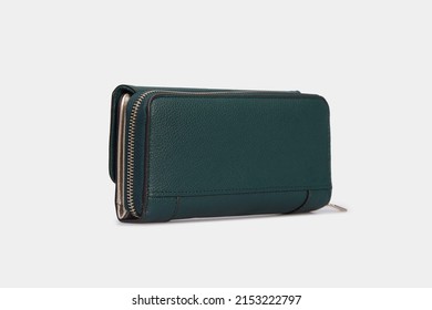 Side view on Emerald green women's Wallet Purse clutch. Leather Pouch for women ladies with zipper isolated on white background - Shutterstock ID 2153222797