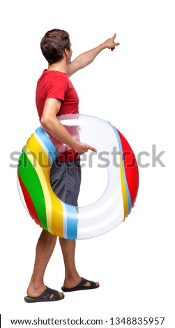 Side view of pointing man that goes to side. backside view of person. Rear view people collection. Isolated over white background. Guy on the move with a circle shows his hand.