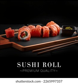 Side view of portion of Japanese sushi roll with caviar, avocado and salmon on top served on wooden board with chopsticks. Dish on black background with text, copy space. Ready advertising banner