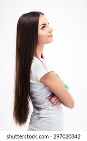 Side View Portrait Of A Pensive Young Woman Looking Up Isolated On A White Background