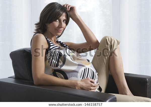 Side View Portrait Pregnant Woman Sitting Stock Photo Edit Now 146158757