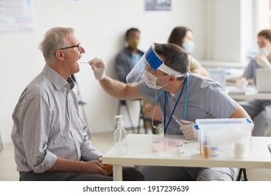 Side View Portrait Of Senior Man Taking Covid Test In Vaccination Center Or Clinic, Copy Space