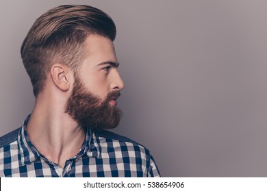 Side view portrait of thinking stylish young man looking away