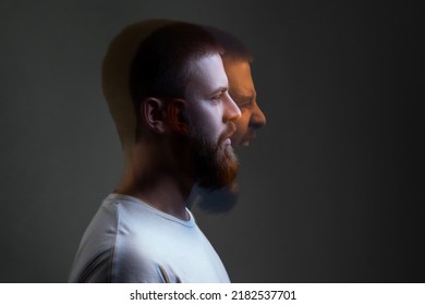 Side View Portrait Of Two-faced Man In Calm Serious And Angry Screaming Expression. Different Emotion Inside And Outside Mood. Internally Suffering, Dissociative Identity Disorder. Double Exposure.