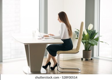 Side View Portrait Of Young Woman In A Formal Wear Working At The Modern Office Desk, Competent Secretary, Office Etiquette, Professional Opportunities And Rights For Women, Small Office Environment